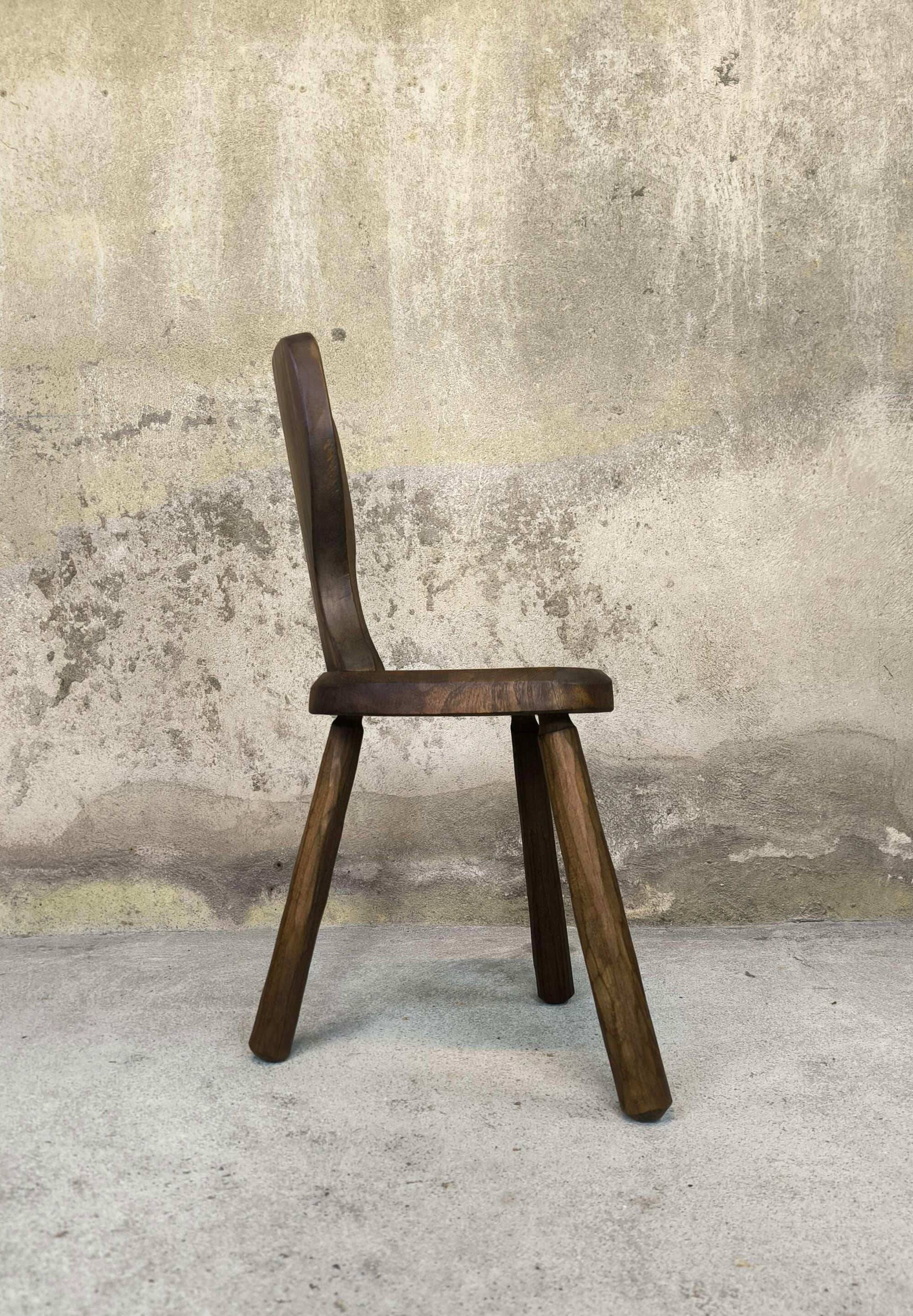 Vintage tripod chair made of solid wood.