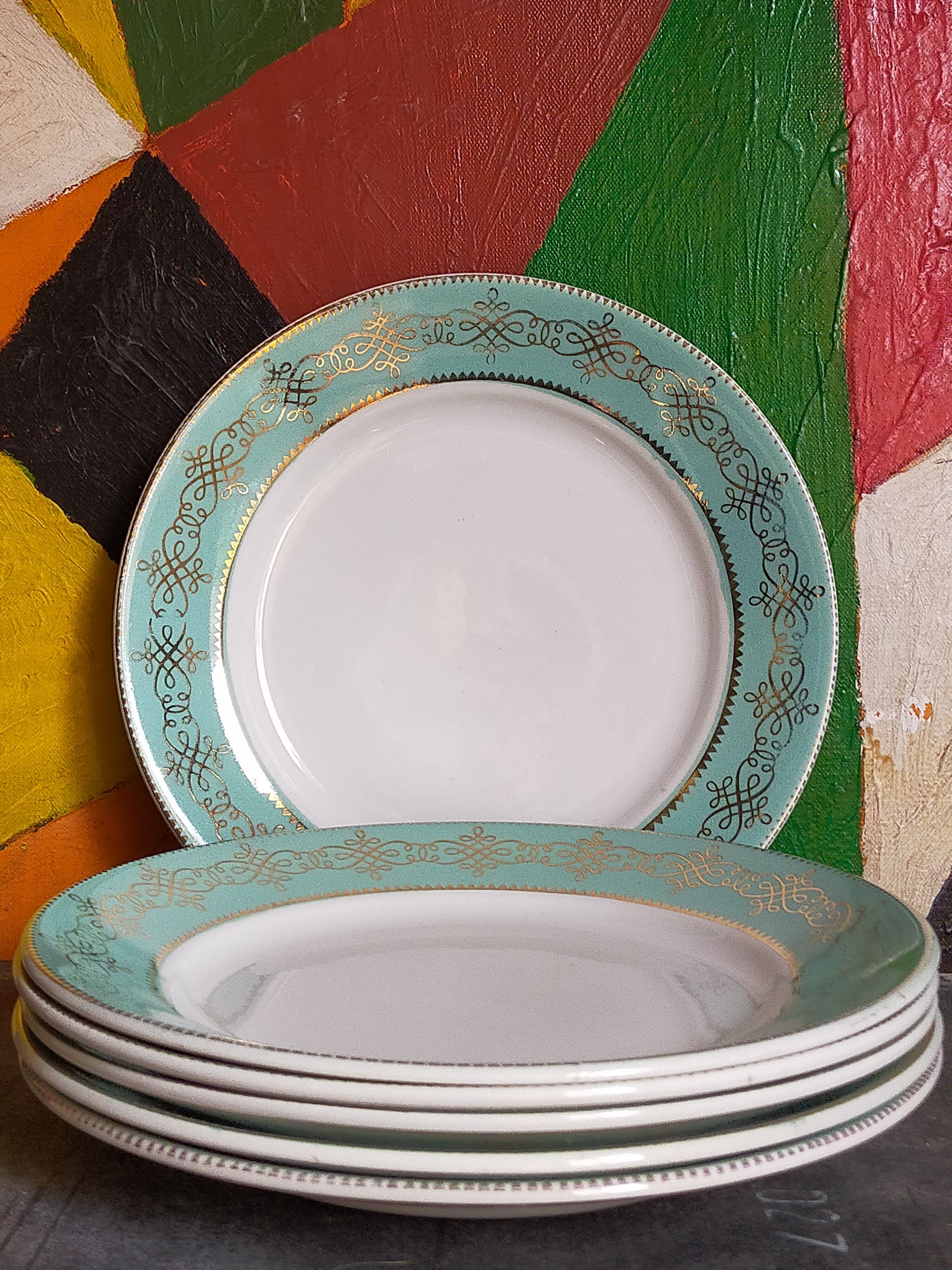 Six plates of vintage Badonviller earthenware with gold frieze