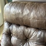 1970s Scandinavian armchair in curved laminated wood with a leather seat.