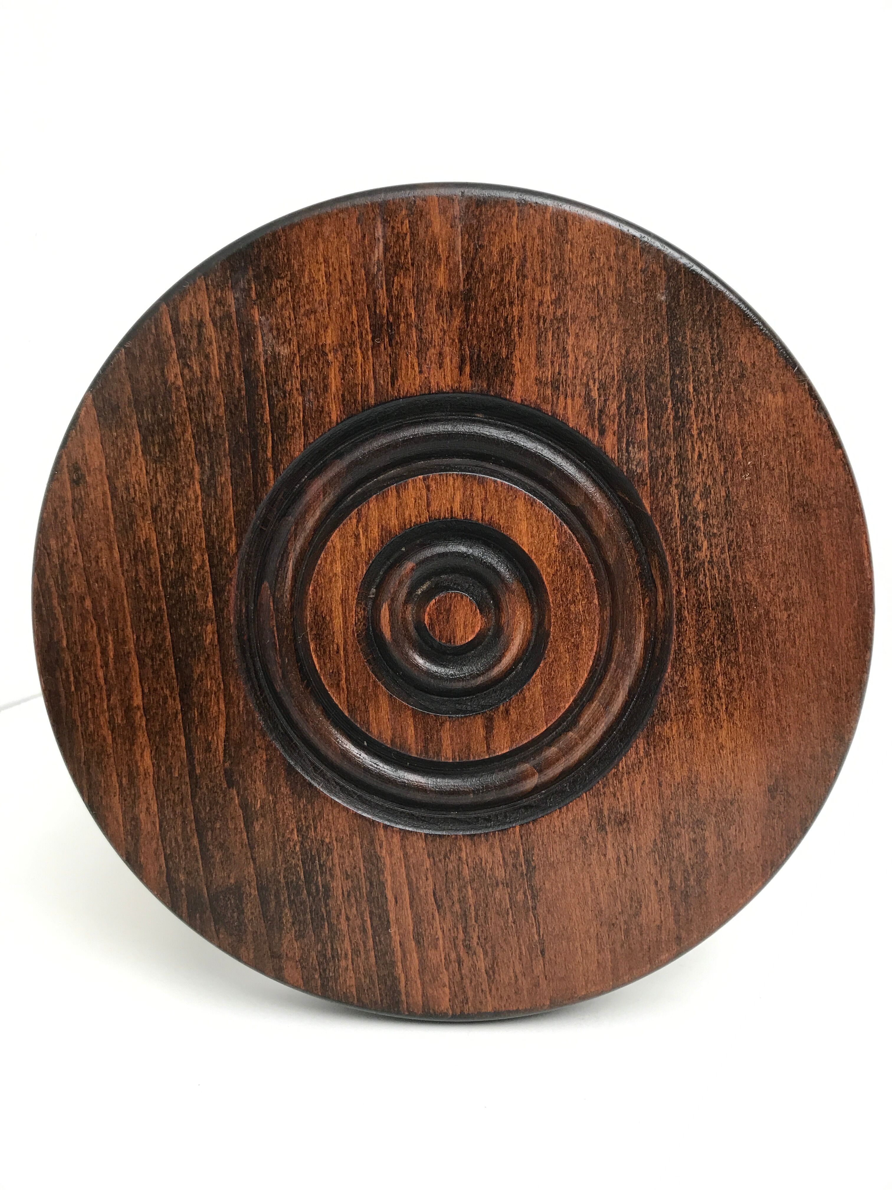 Wooden stool turned tripod foot