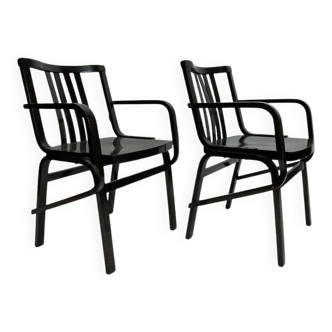 Mid-century black armchairs