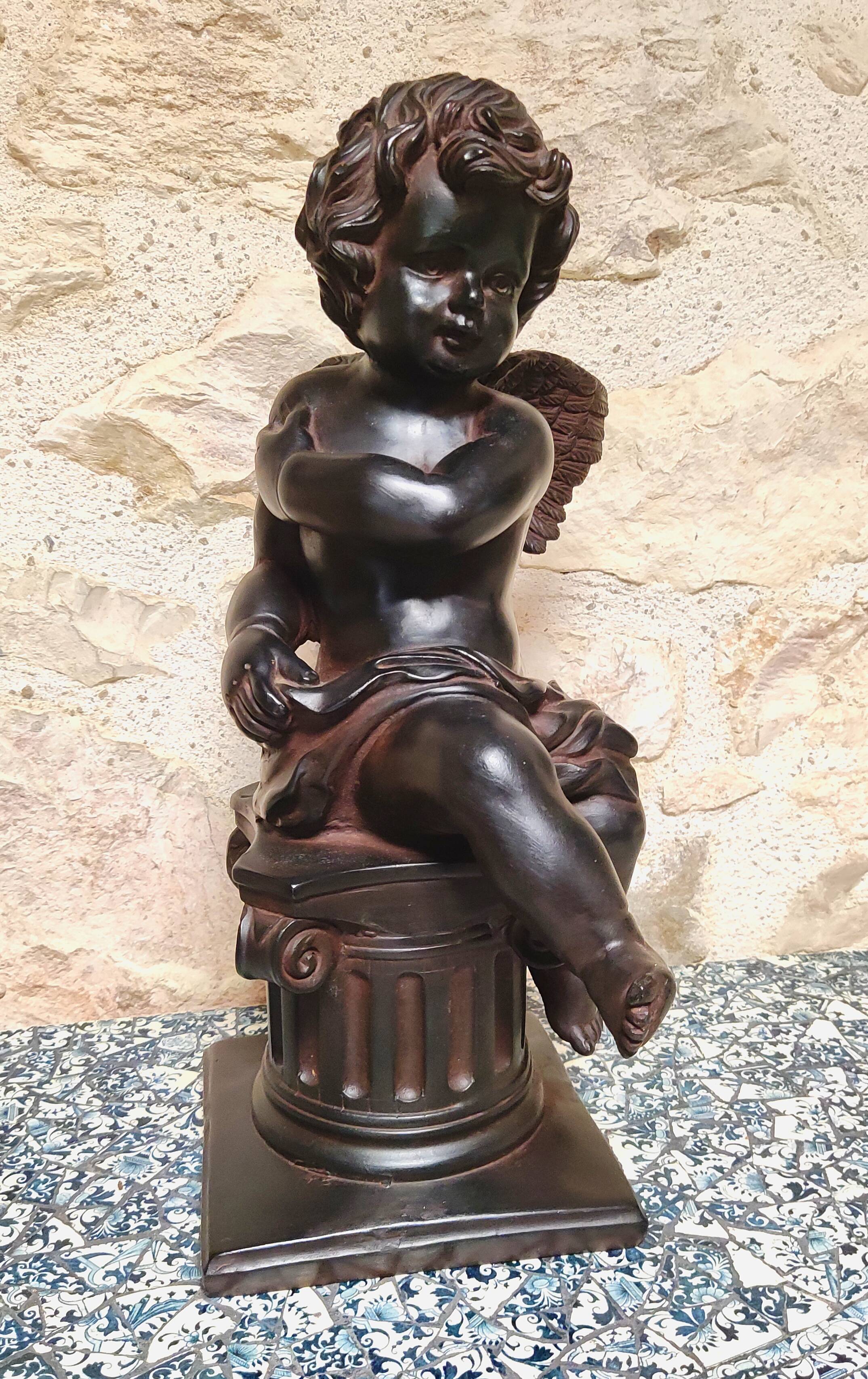 Patinated plaster sculpture - cherub
