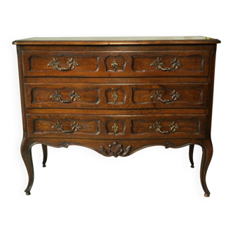 Louis XV style commode in solid oak, 20th century.