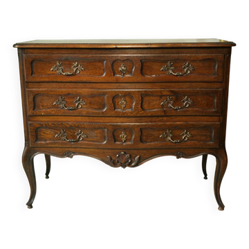 Louis XV style commode in solid oak, 20th century.