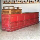 Former red patina and oak tray trading counter