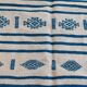 Traditional handmade white and blue kilim rug in natural wool