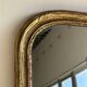 Large gilded mirror 19th century rounded corners mercury glass Louis XVI style