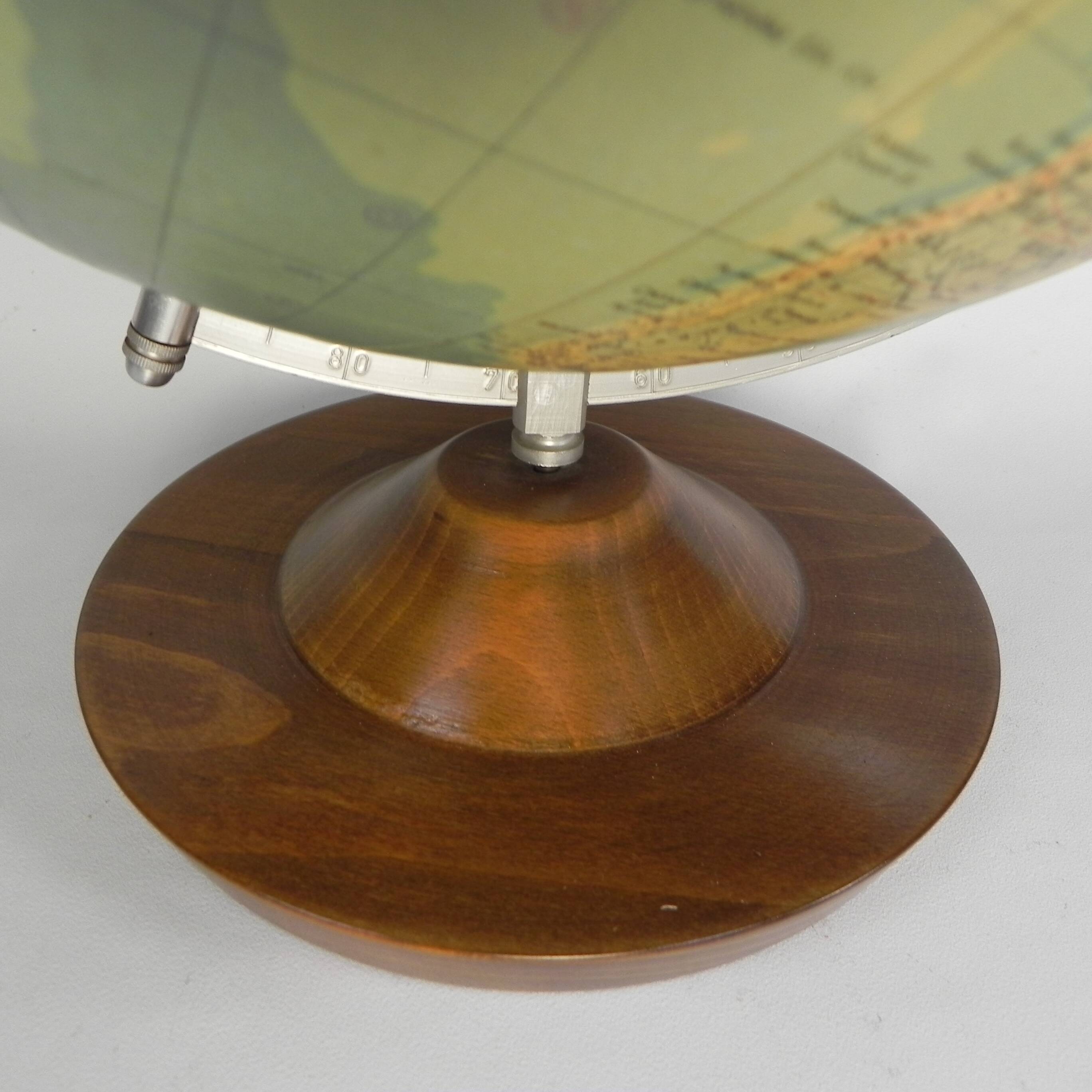 Paper mache globe on a wooden base, 1975