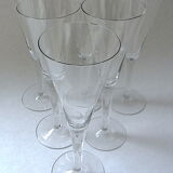 Suite of six colorless crystal champagne flutes