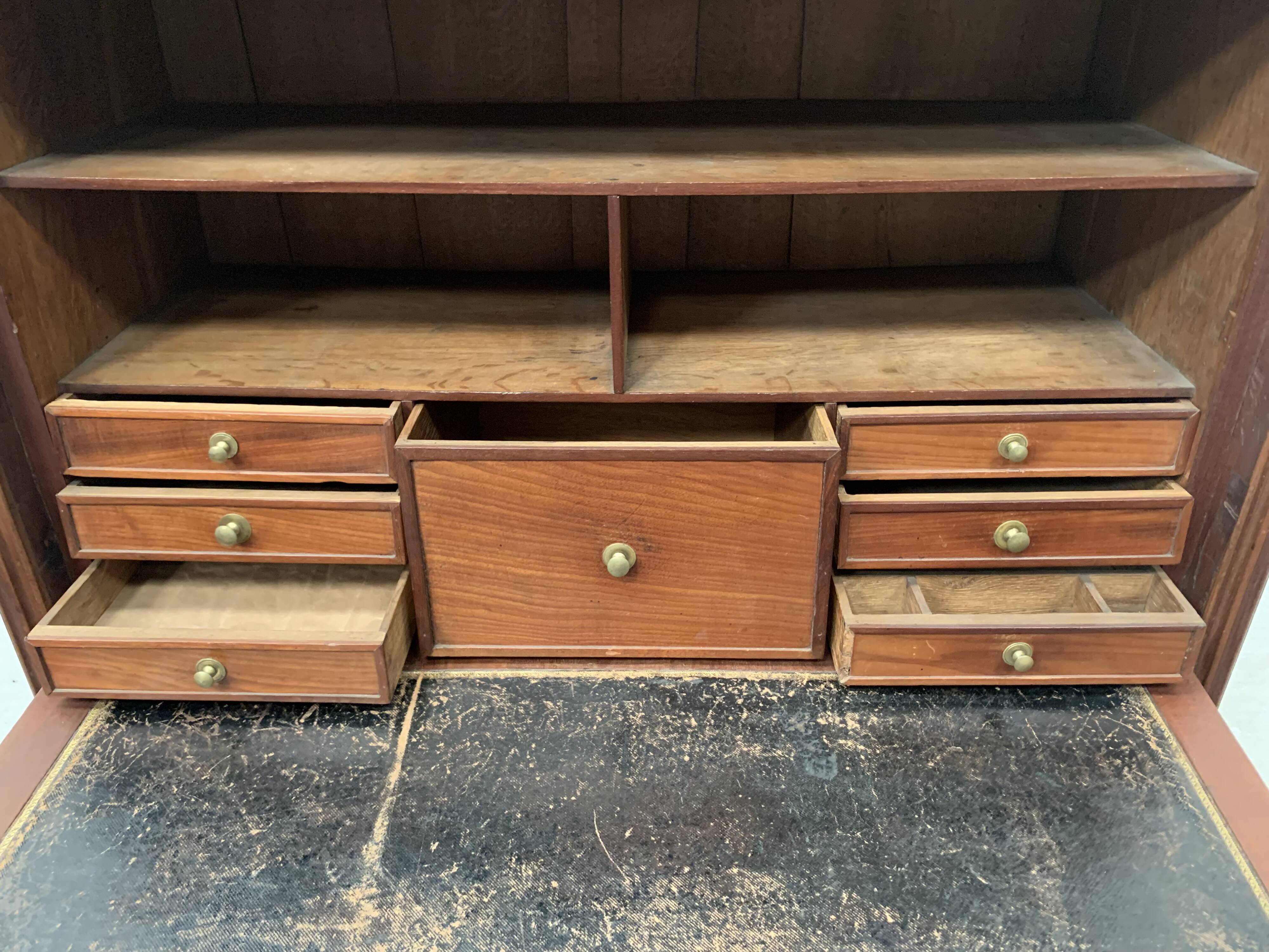 Secretary Louis XVI in mahogany Top of veined gray marble XIX century