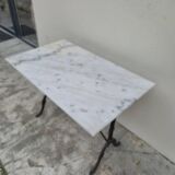 Antique cast iron and marble bistro restaurant table