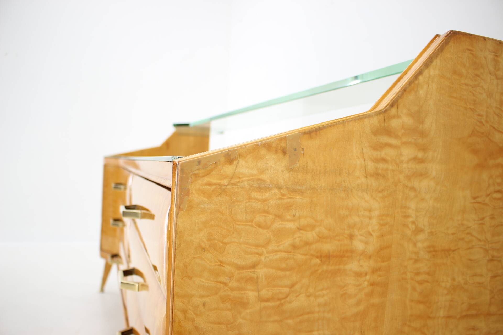 1960s italian sideboard/chest of drawers in high gloss finish with glass top and shelf