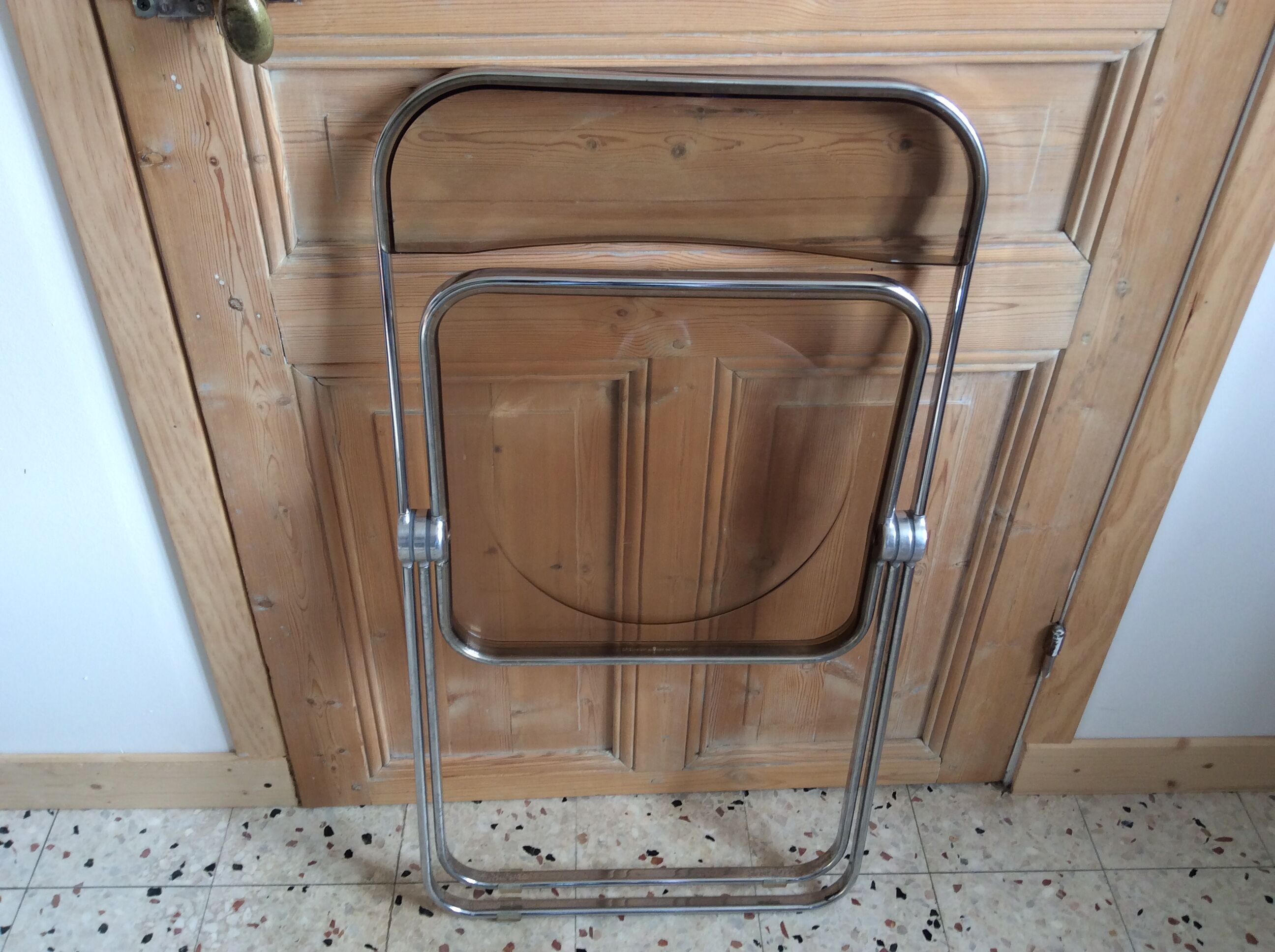 Folded chair by Giancardo Piretti for Castelli