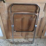 Folded chair by Giancardo Piretti for Castelli