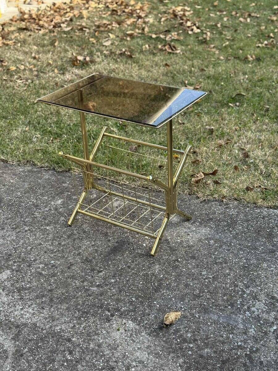 Mid-century modern brass and smoked glass side table with integrated magazine holder, 1970s