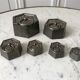set of old measuring weights early twentieth century