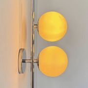 Pair of vintage wall lights in chrome metal and opaline, France 1970.