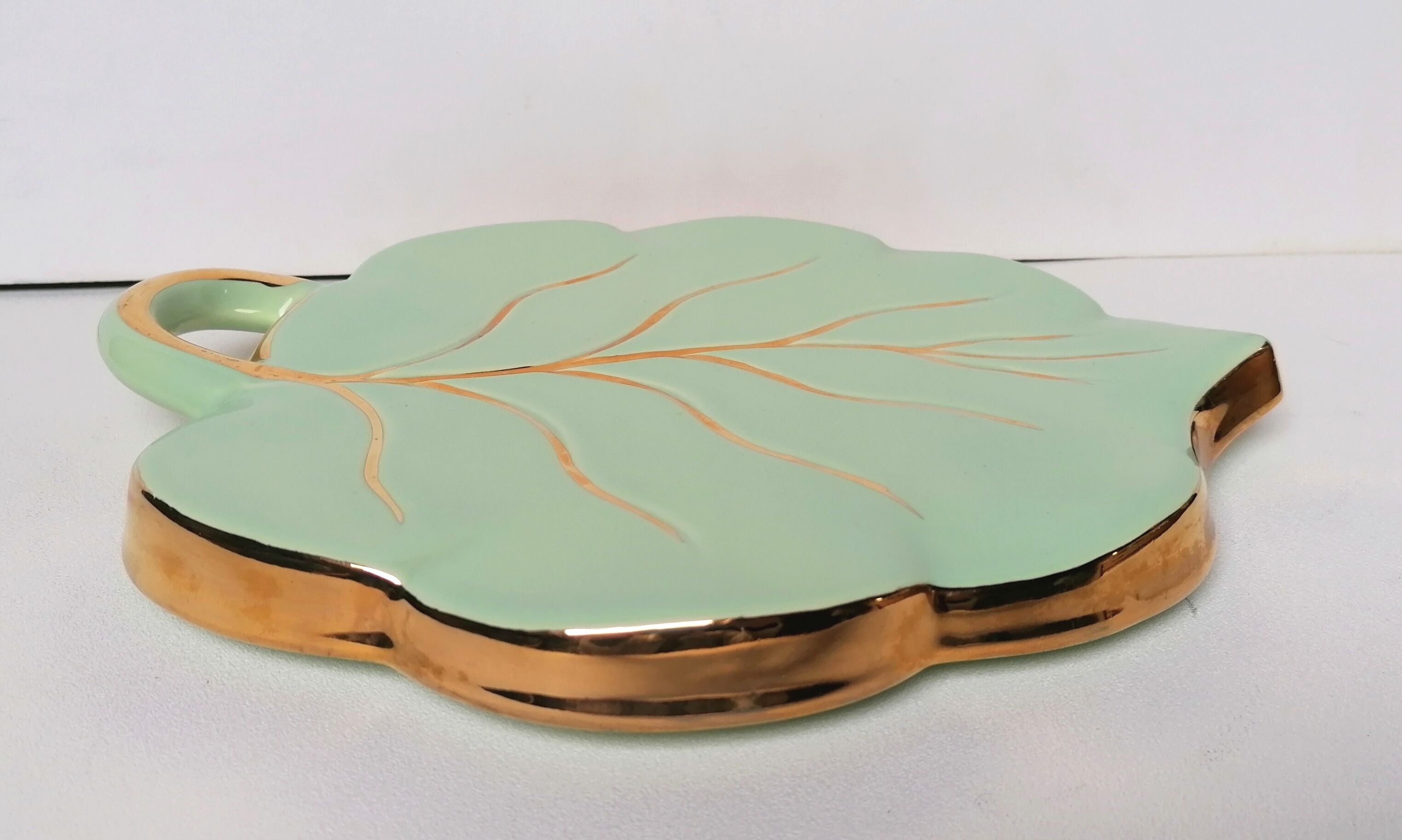 Celadon green leaf trivety and gilding