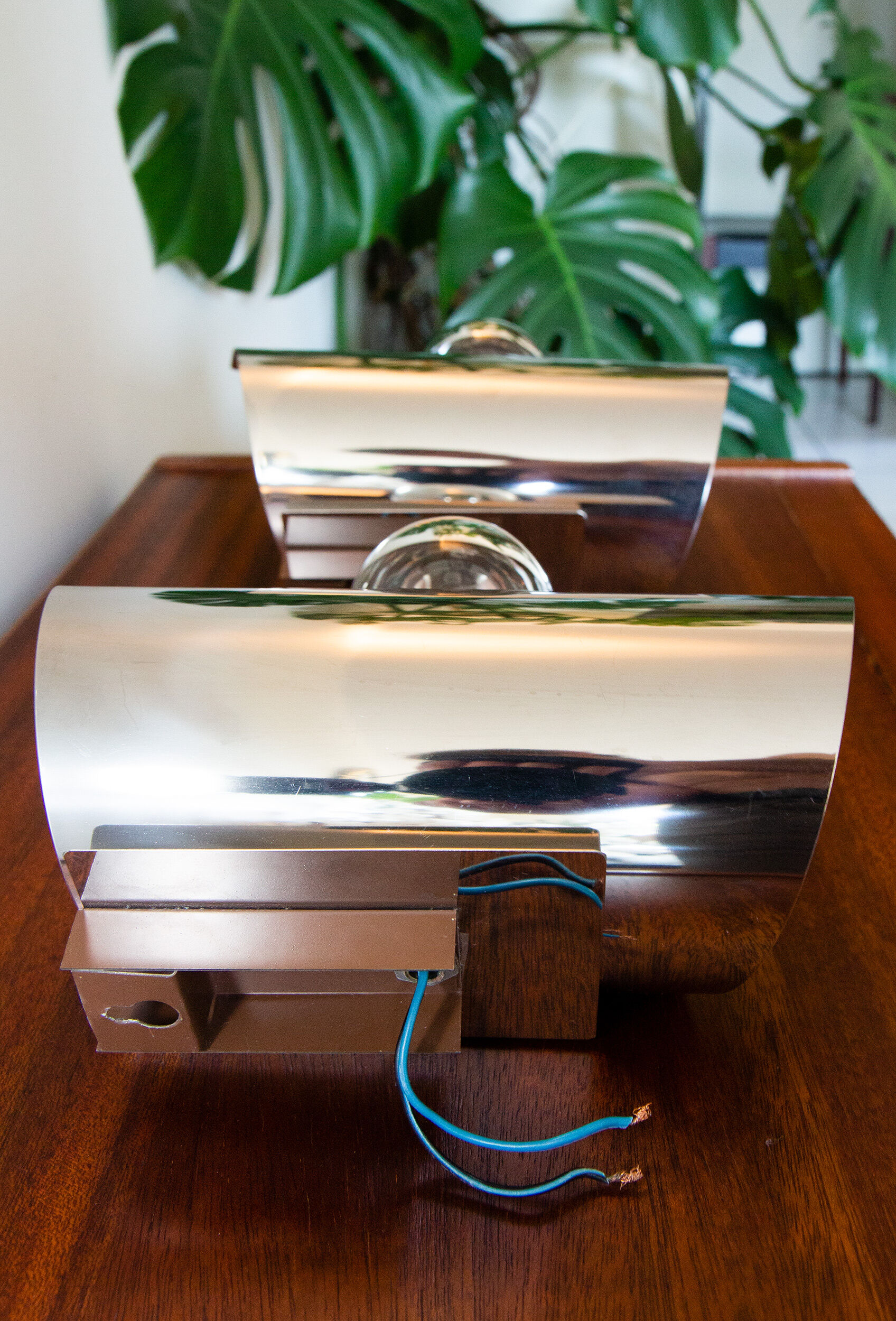 Pair of twisted wall lamps, chromed steel, year 70