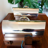 Pair of twisted wall lamps, chromed steel, year 70