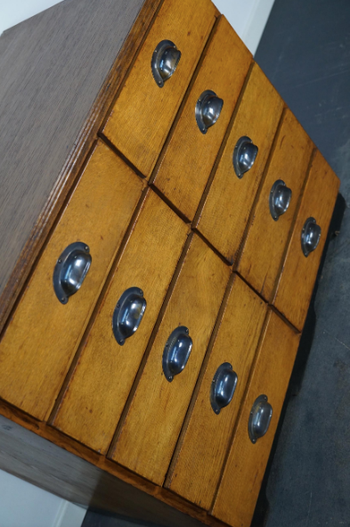 Apothecary cabinet or bank of drawers in oak and German pine mid-twentieth century