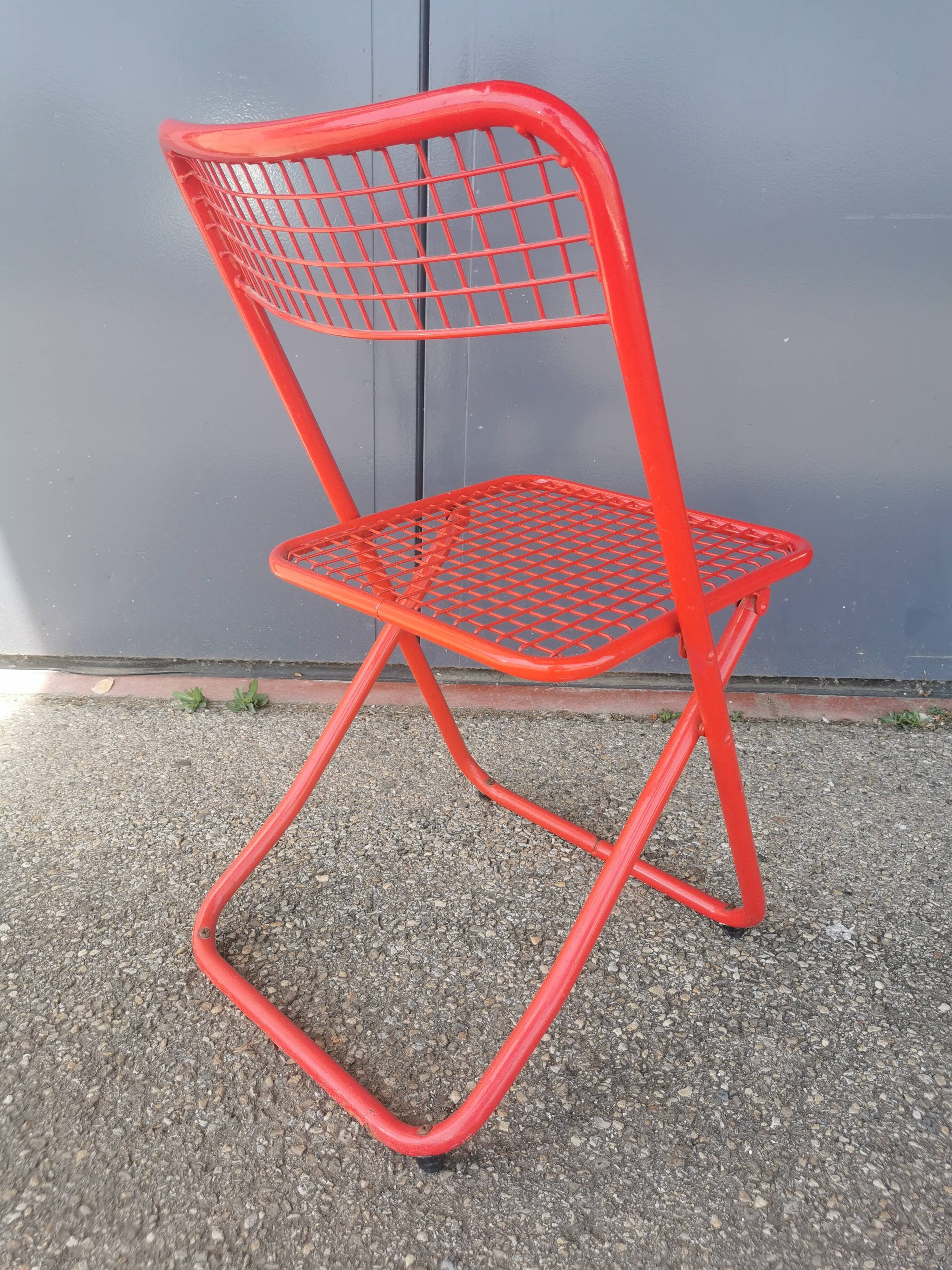 Vintage red metal folding chair