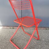 Vintage red metal folding chair