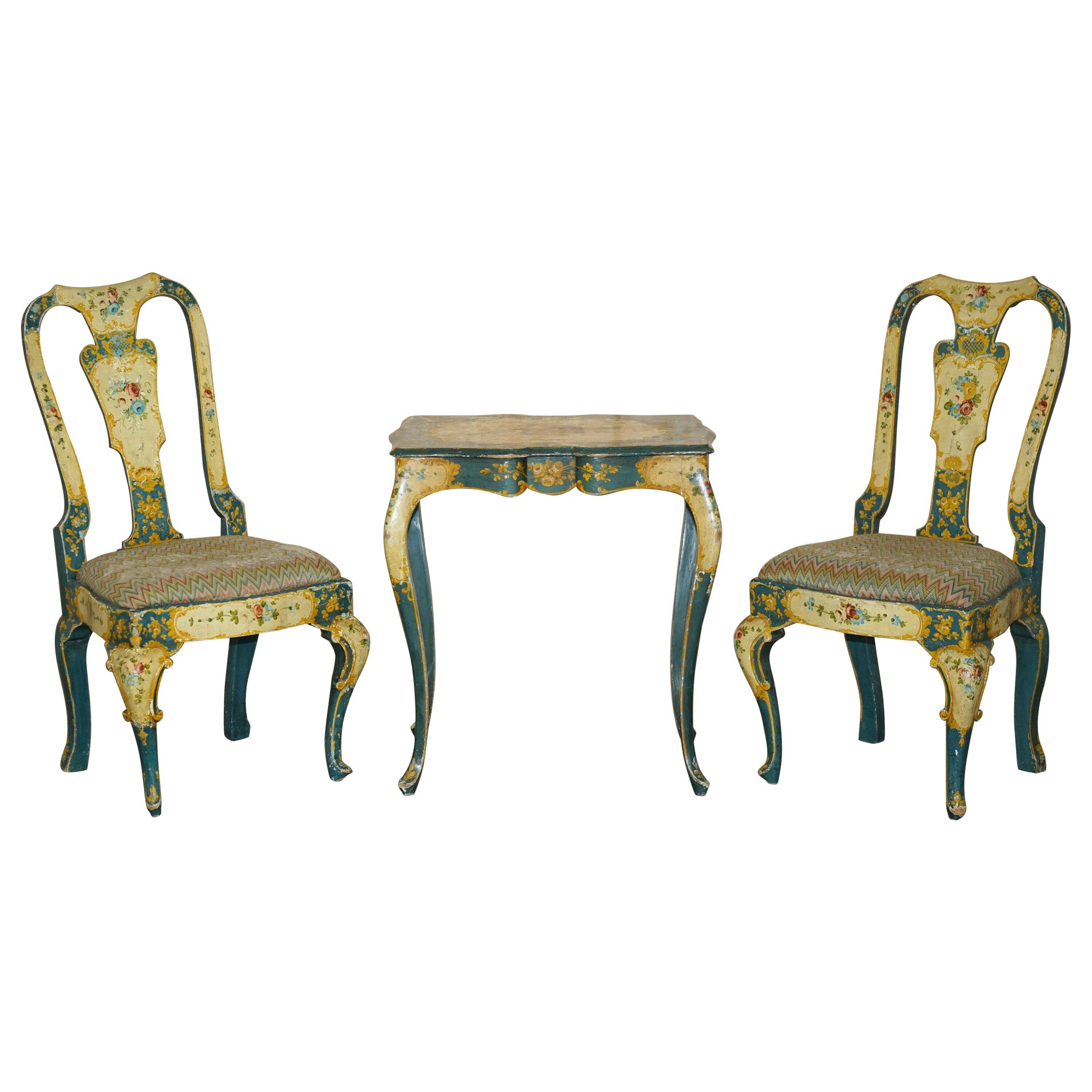 Pair of antique Regency chairs and matching table.