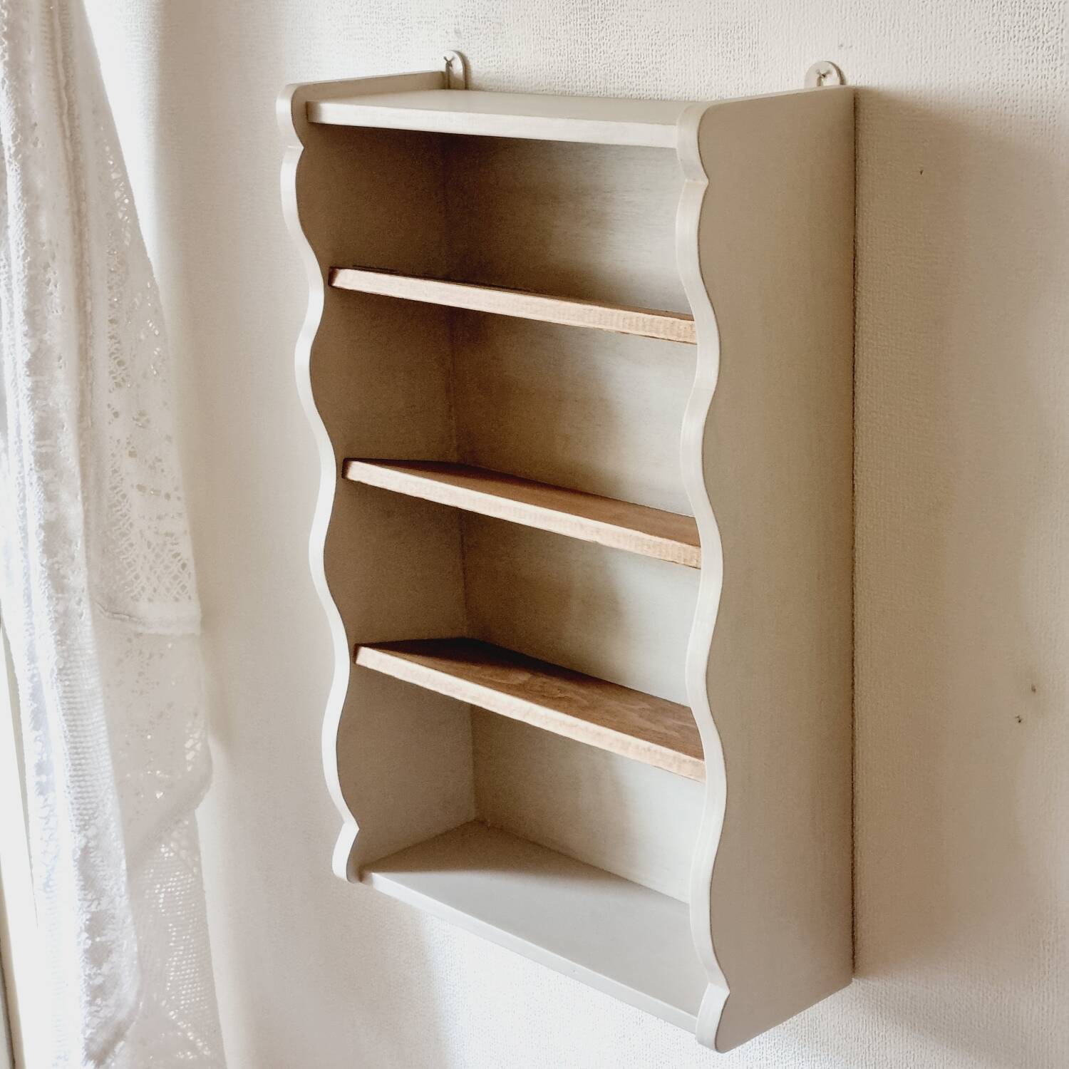 Linen-colored wooden shelf
