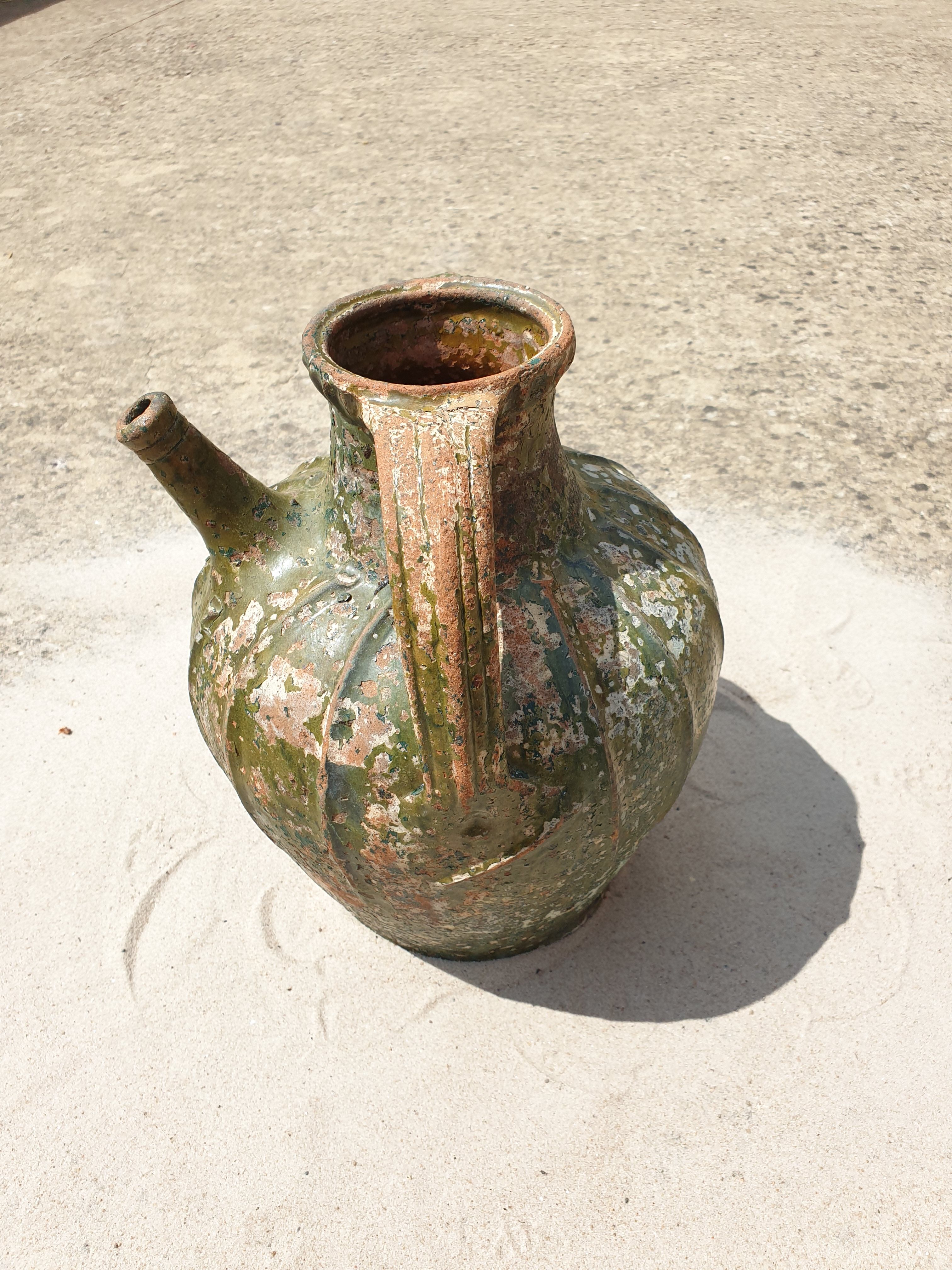 Dig jug pottery vase ancient terracotta green