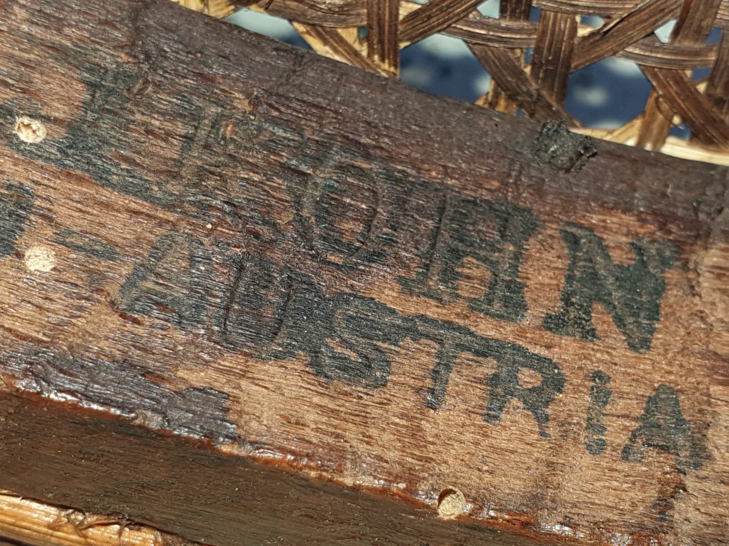Curved wooden piano stool