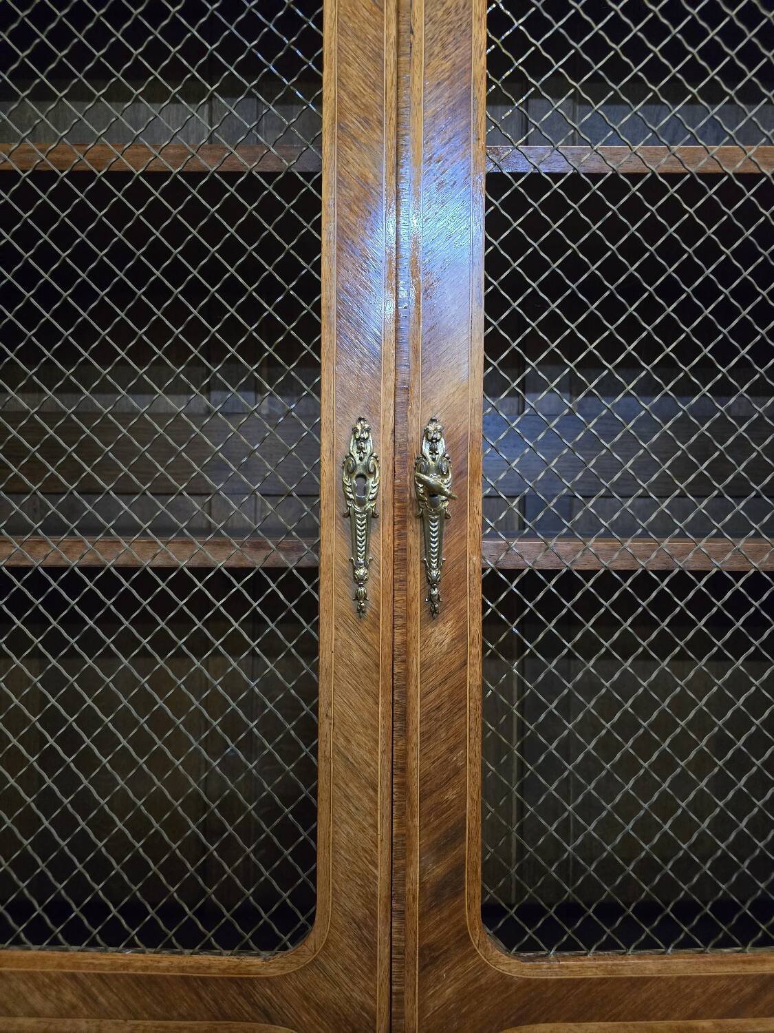 Marquetry bookcase with marble top