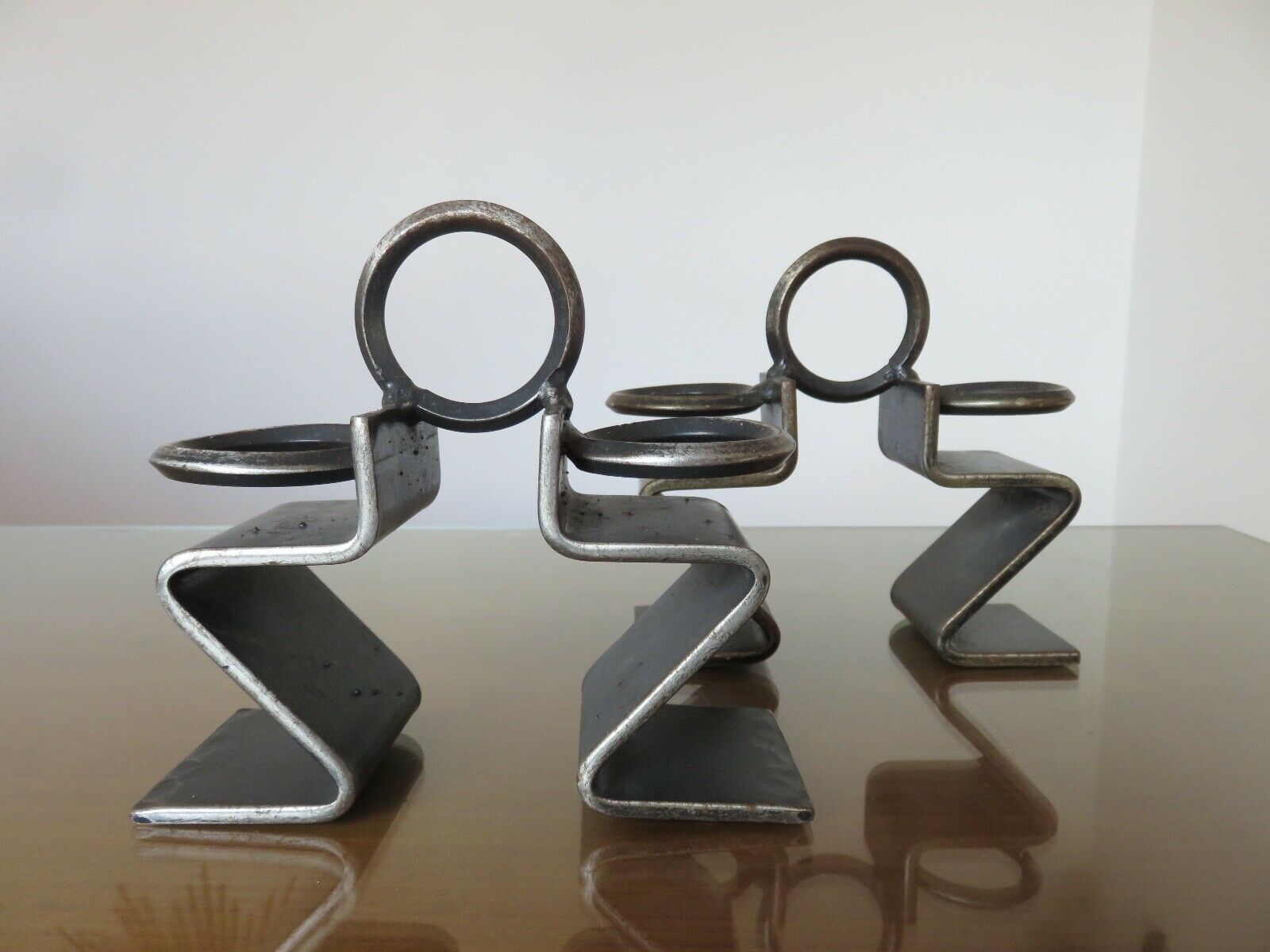 Serre brutalist books in raw steel 70s