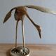 Oiseau prend son envol en laiton
