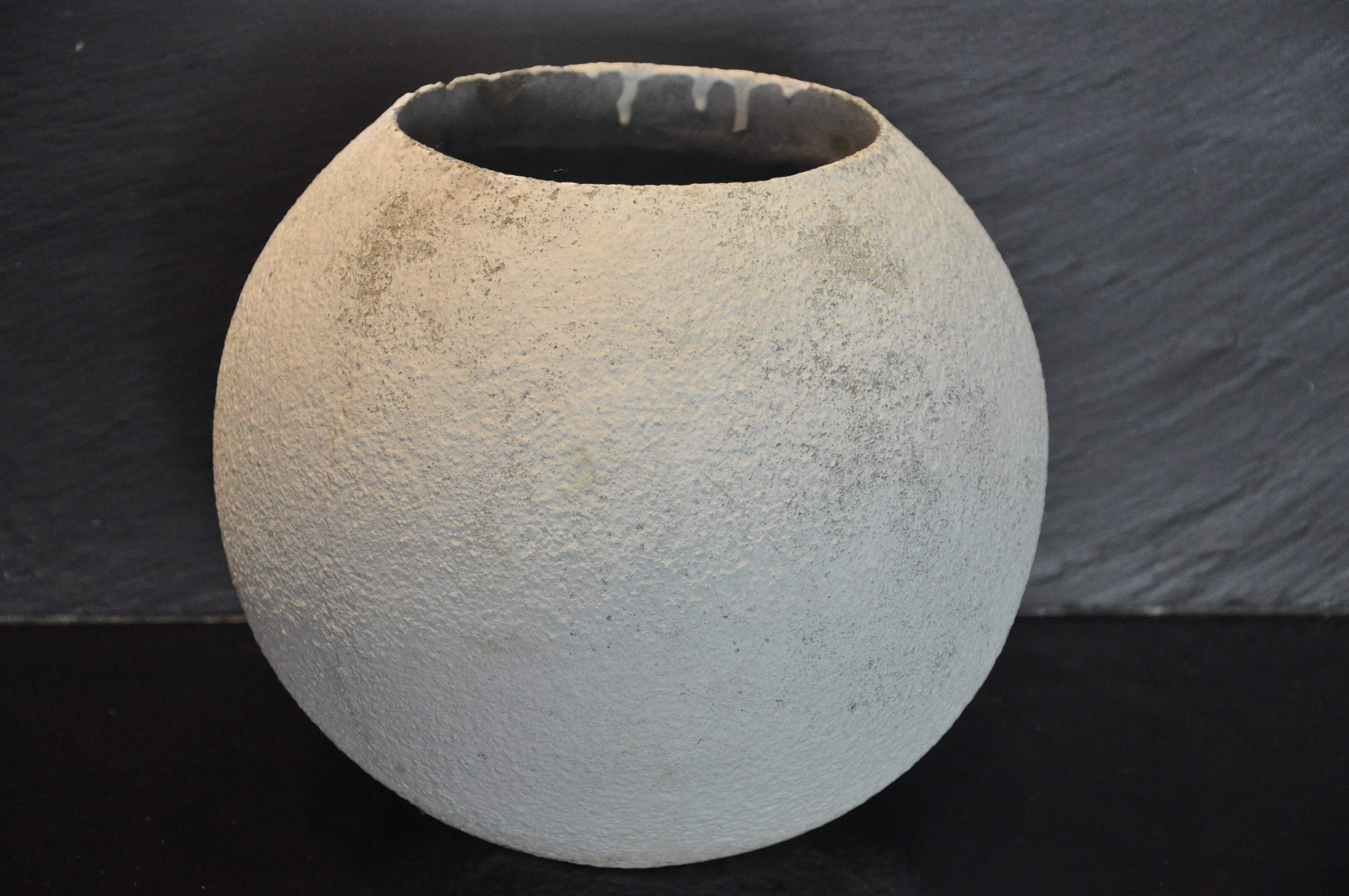 Cement ball planter from the 1960s