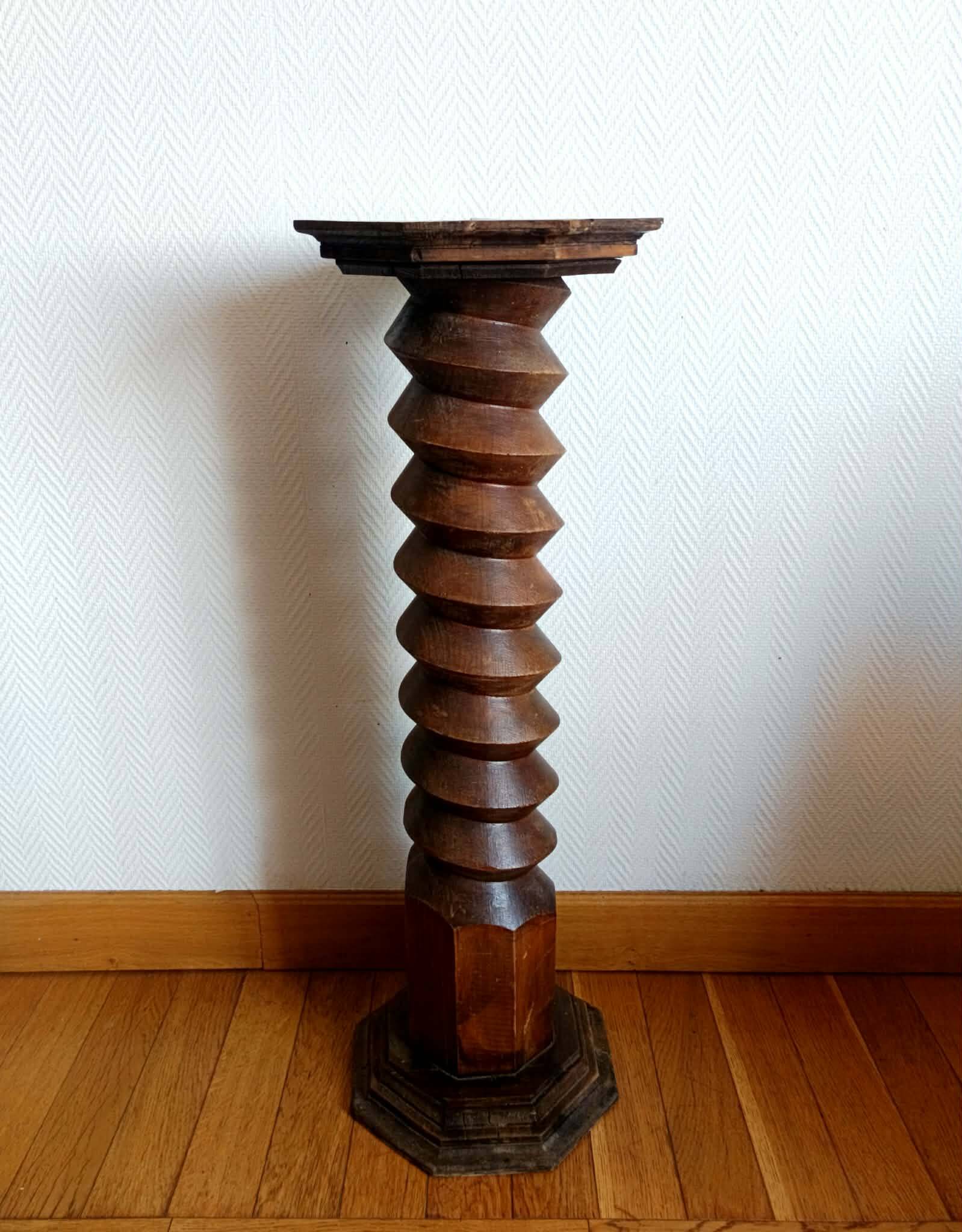 Screw press stool in carved wood