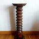 Screw press stool in carved wood