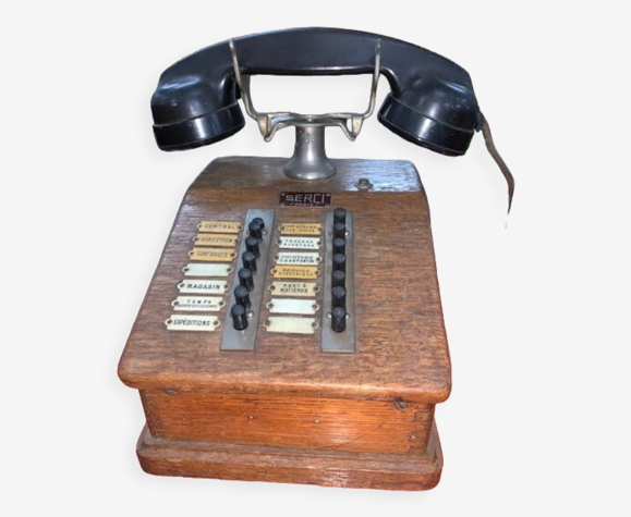 Téléphone de bureau ancien en bois