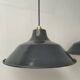 Pair of enamelled sheet metal suspensions