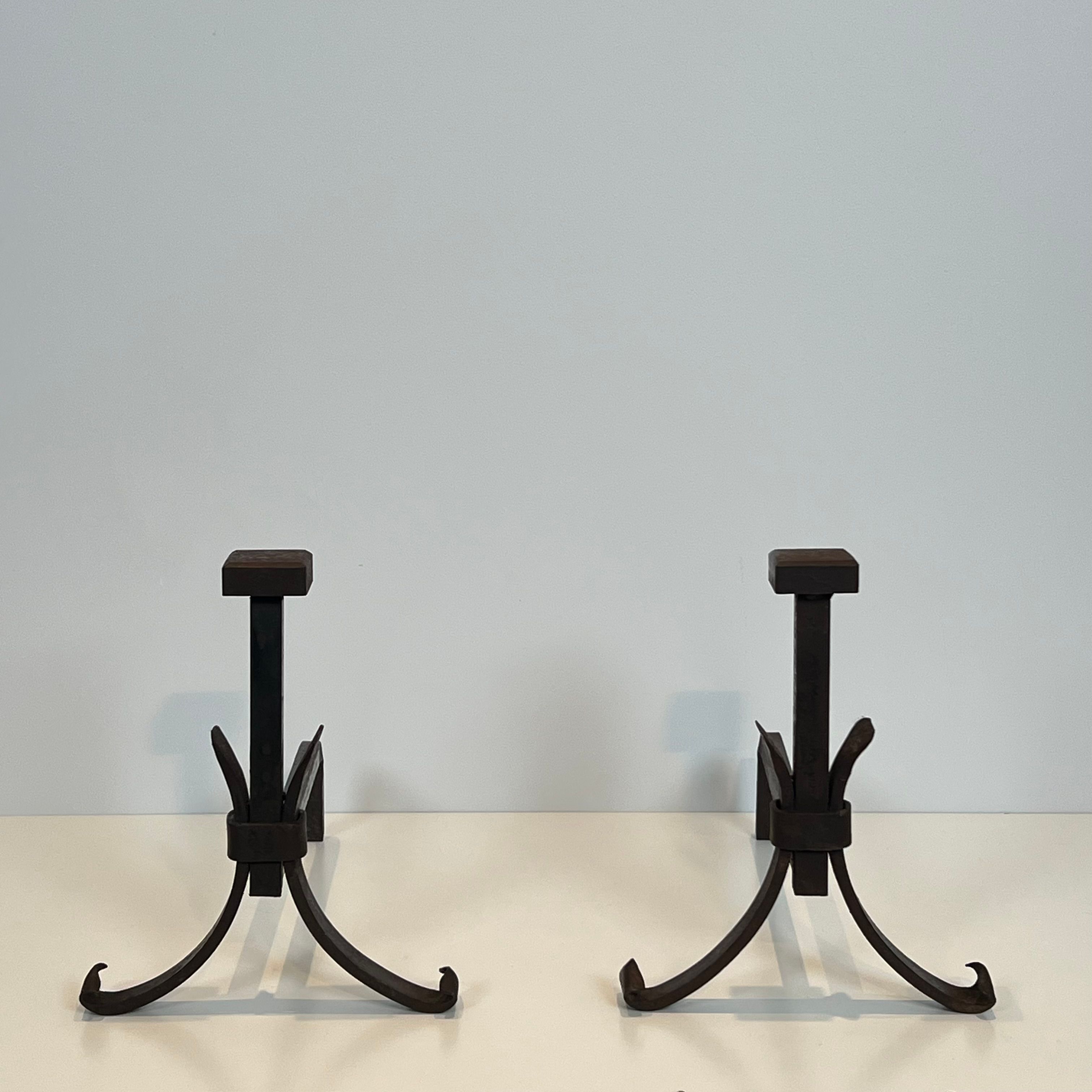 Pair of modernist wrought iron fire dogs