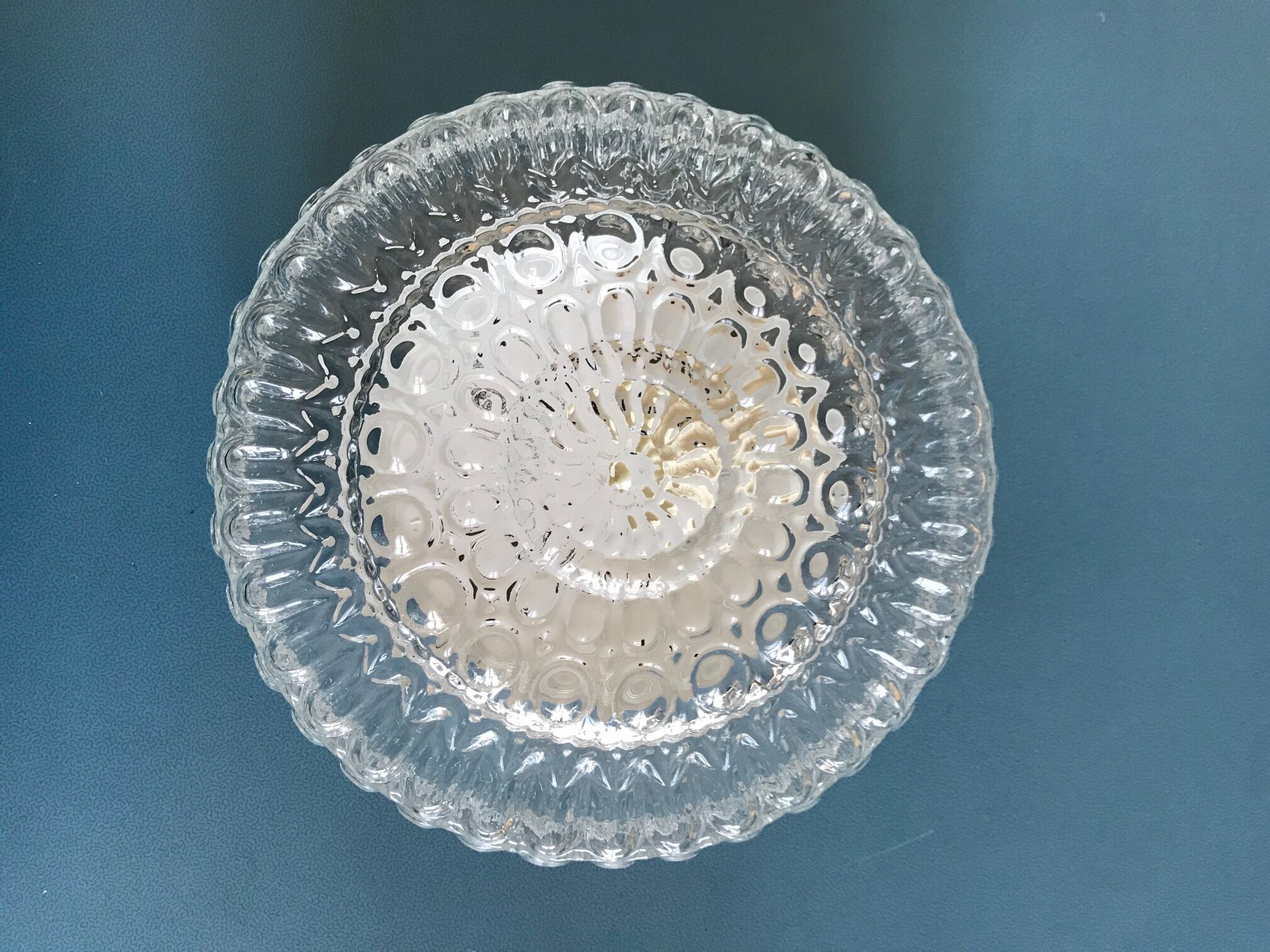 Round ceiling light in chiseled glass