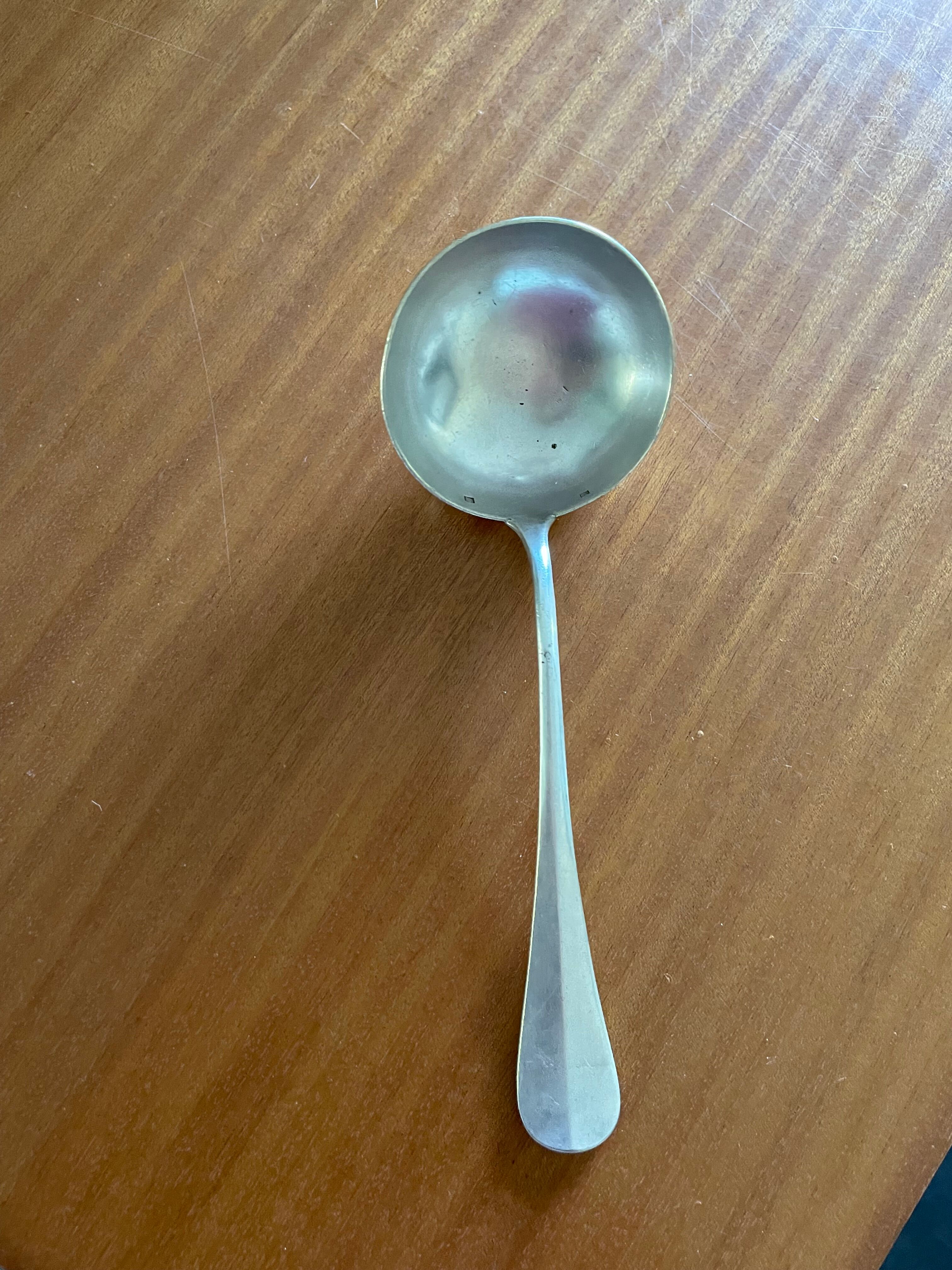 Silver metal ladle