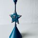 Metal star candle holder