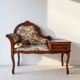 Antique wooden telephone bench in dark brown.