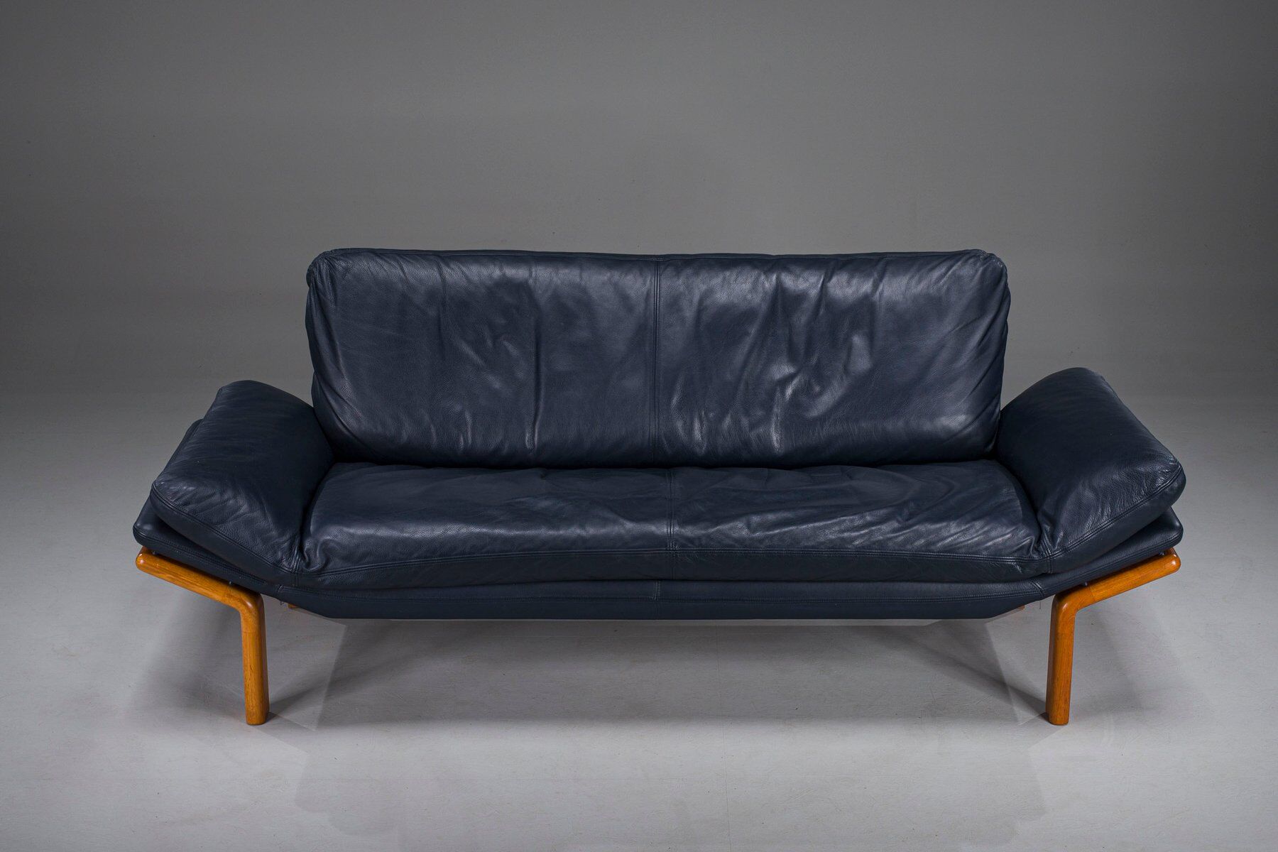 Danish teak and navy blue leather 3-seater sofa from Komfort, 1970s