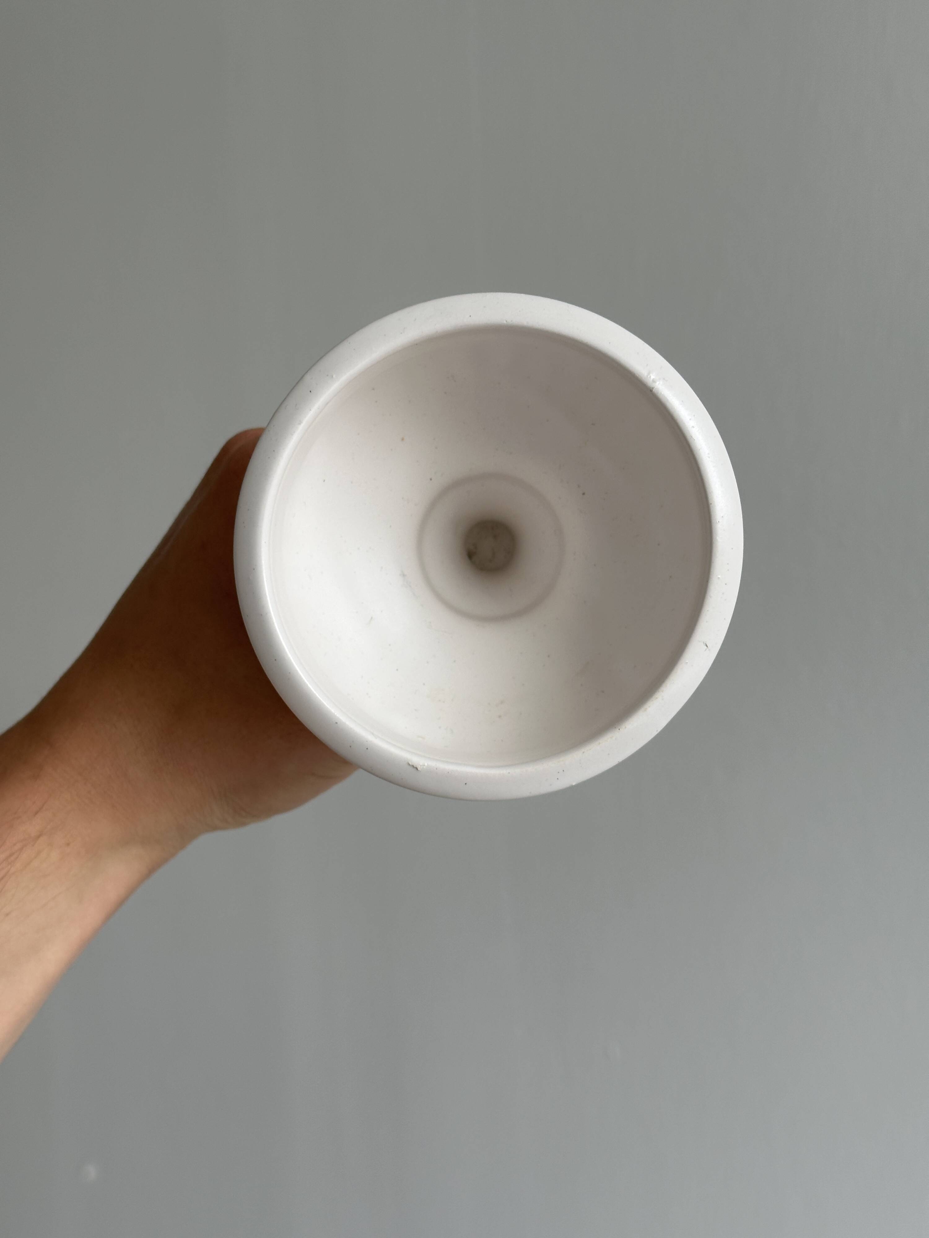 Off-white ceramic footed bowl