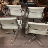 Suite of 4 armchairs in white Ray and Charles Eames leather