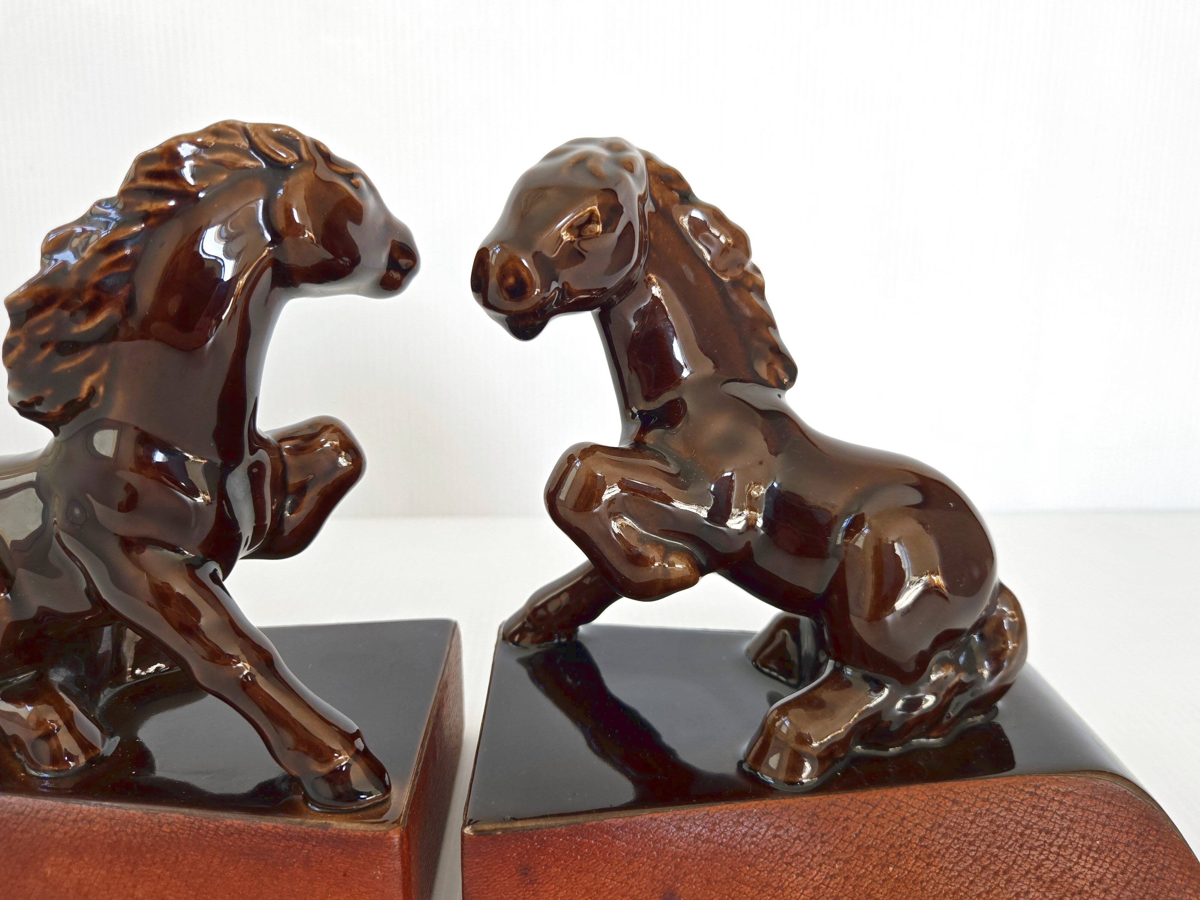 Pair of vintage leather & ceramic bookends