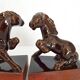 Pair of vintage leather & ceramic bookends