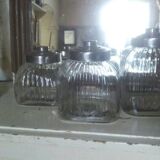 three large glass jars